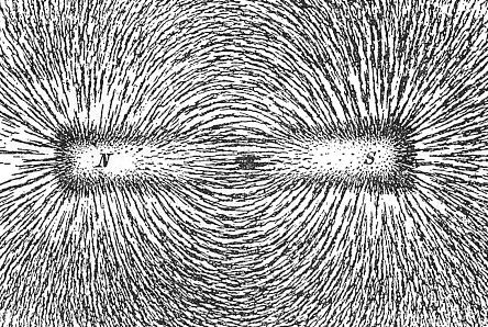 An iron-filing diagram showing a bar magnet and the iron filings aligning with the magnet fields of the magnet.